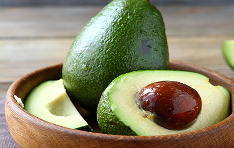 Close up photo of avocado in bowl